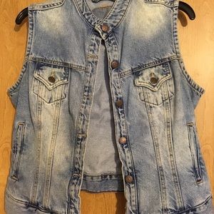 Levi misses large denim vest.